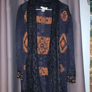 Long navy blue and orange sweater tribal design